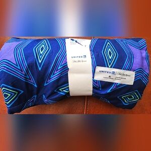 New Saks Fifth Avenue x United Airlines Claude Kameni Limited Edition Blanket